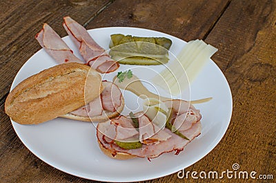 Open sandwich with cheese, baquette, ham