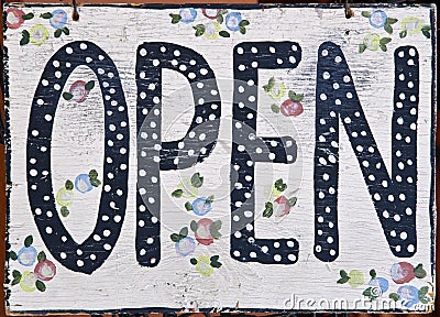 Open sign in store window