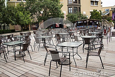 Open square tables and chairs,