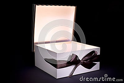 Opened gift box with inner light