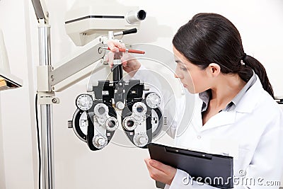 Optometrist Looking at Phoropter