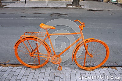 Orange bicycle on the street