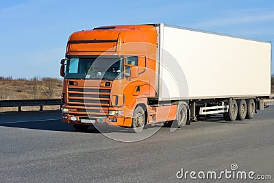 Orange truck with white container