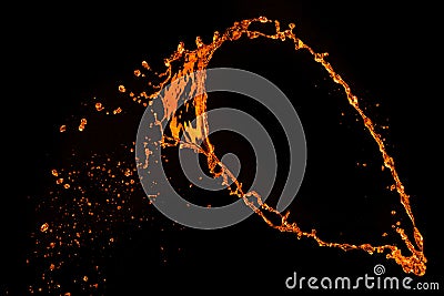 Orange water splash isolated on black