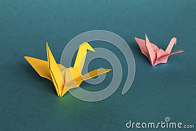 Origami cranes in tandem