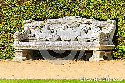 Ornamental English garden with stone bench