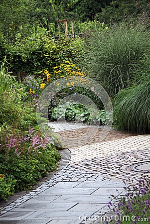 Ornamental garden path with perennial plants