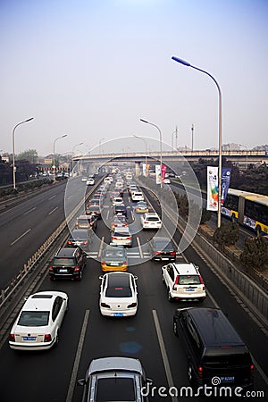 Overpass, the highway, traffic flow