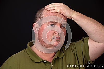 Overweight male with a sore head pain