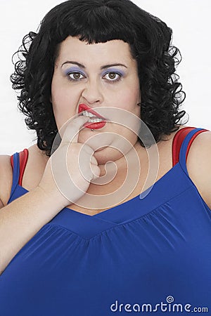 Overweight Woman Curling Lip And biting Finger