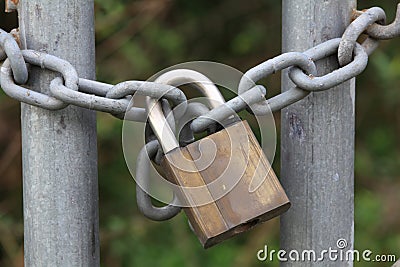 Padlock on chain close-up