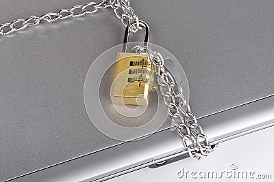 Padlocked laptop with chains