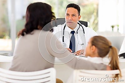 Paediatrician consulting patient