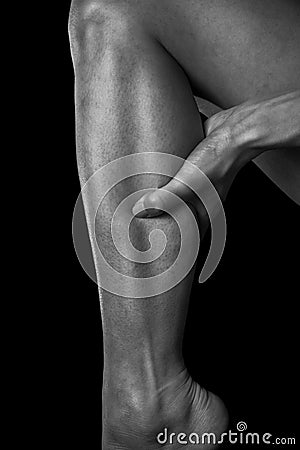 Pain in the female calf muscle