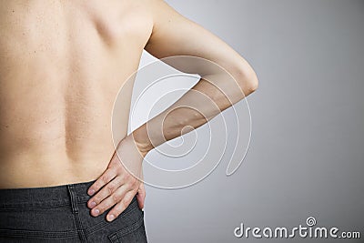 Pain in the lower back in men