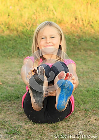 Painted soles of a little kid - girl