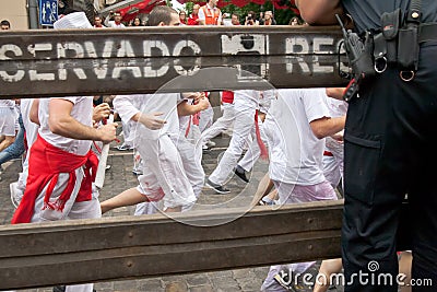 PAMPLONA, SPAIN -JULY 7: Bulls run down the street