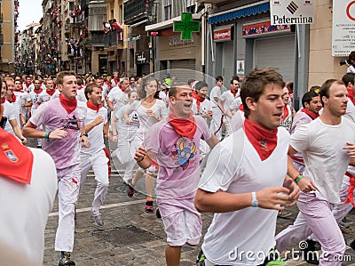 PAMPLONA, SPAIN -JULY 7: Bulls run down the street