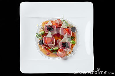 Pan-asian seafood cuisine with tuna in sauce and caviar