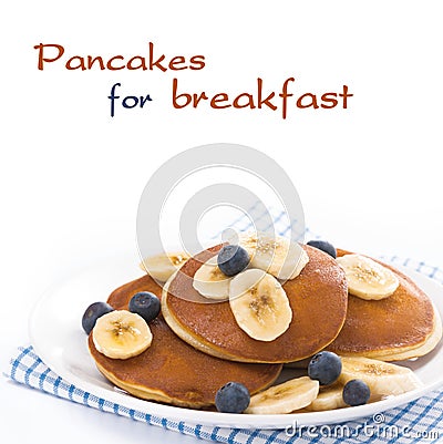 Pancakes with banana and blueberries, isolated