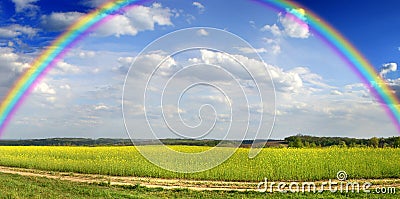 Panorama of the field with rainbow