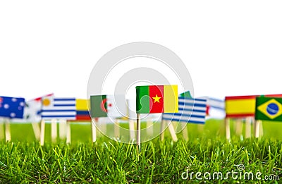 Paper cut of flags on grass for Soccer championship 2014