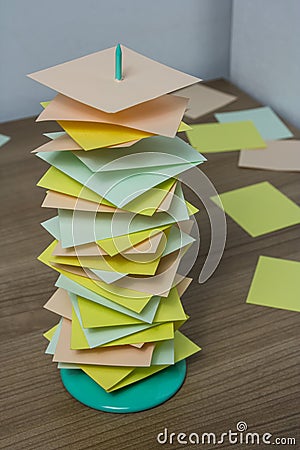 Paper holder stand on the wood table with colorful card