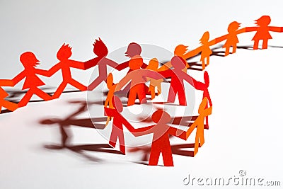 Paper team linked together partnership concept