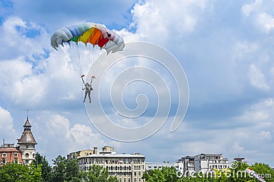 Parachutist over the city