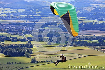 Paraglider over fields