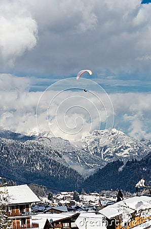 Paragliders flying over the mountain