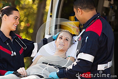 Paramedics talking patient