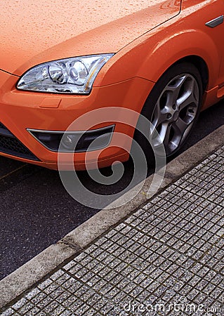 Parked orange sports car