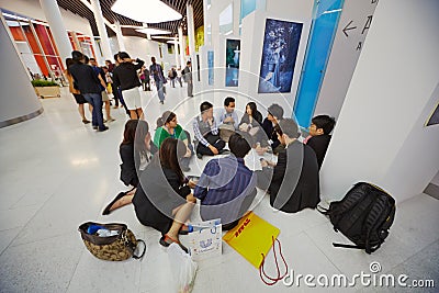 Participants of Global Youth to Business forum sits in lobby