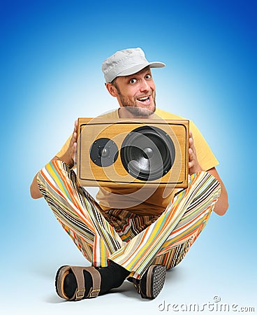 Party man with wooden speaker