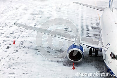 Passenger Airplane on airfield winter