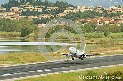 Passenger airplane takeoff from active runway