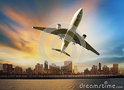 Passenger plane flying above urban scene use for convenience air