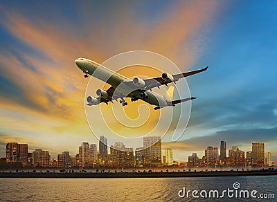 Passenger plane flying above urban scene use for convenience air