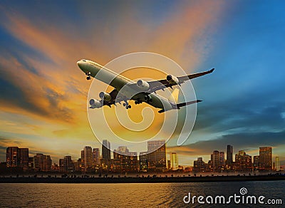 Passenger plane flying above urban scene use for convenience air