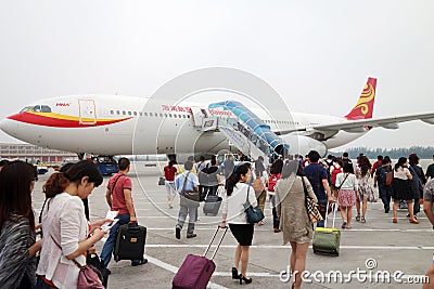 Passengers boarding in Beijing airport