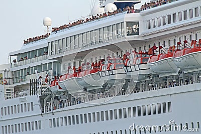 Passengers while greeting from cruise ship sets sail from the po