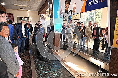 Passengers receive their baggage at the airport Sucre