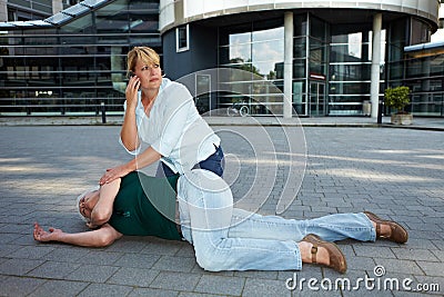 Passerby making emergency call for