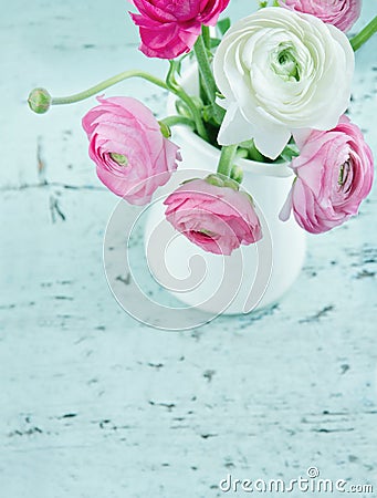 Pastel color flowers on shabby chic background