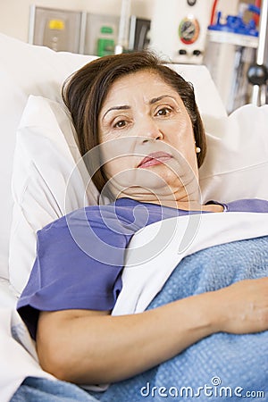 Patient Lying In Hospital Bed