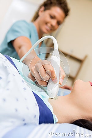 Patient Undergoing Ultrasound Of Thyroid Gland