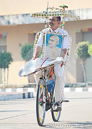 Patriotic person riding a bicycle