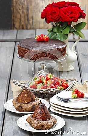 Pear with chocolate on party table