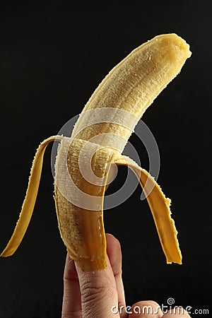 Peeled baby banana